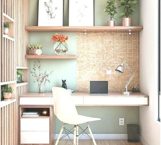 Virtual Assistant. Amber Assists. Desk. office. sage background. orange flowers. white desk. wood desk.